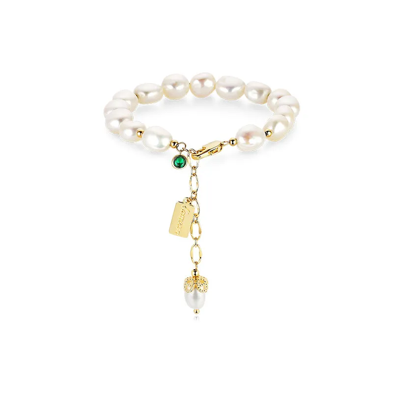 Cultured Pearls and Cross Charm Natural pearl bracelet with elegant charms for women