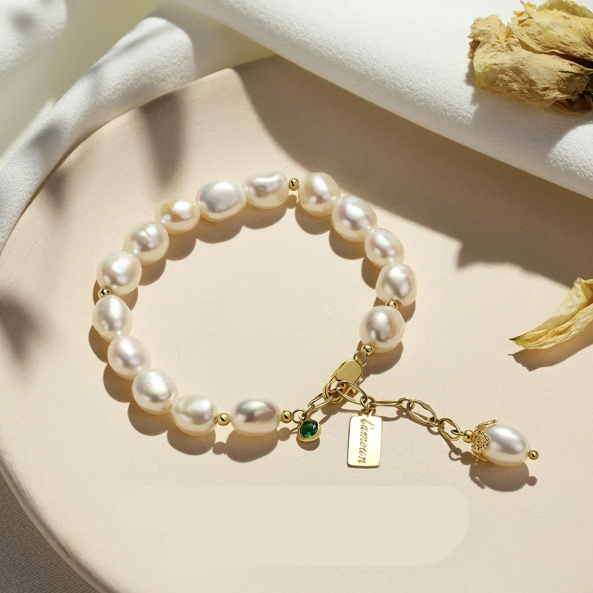 Cultured Pearls and Cross Charm Natural pearl bracelet with elegant charms for women