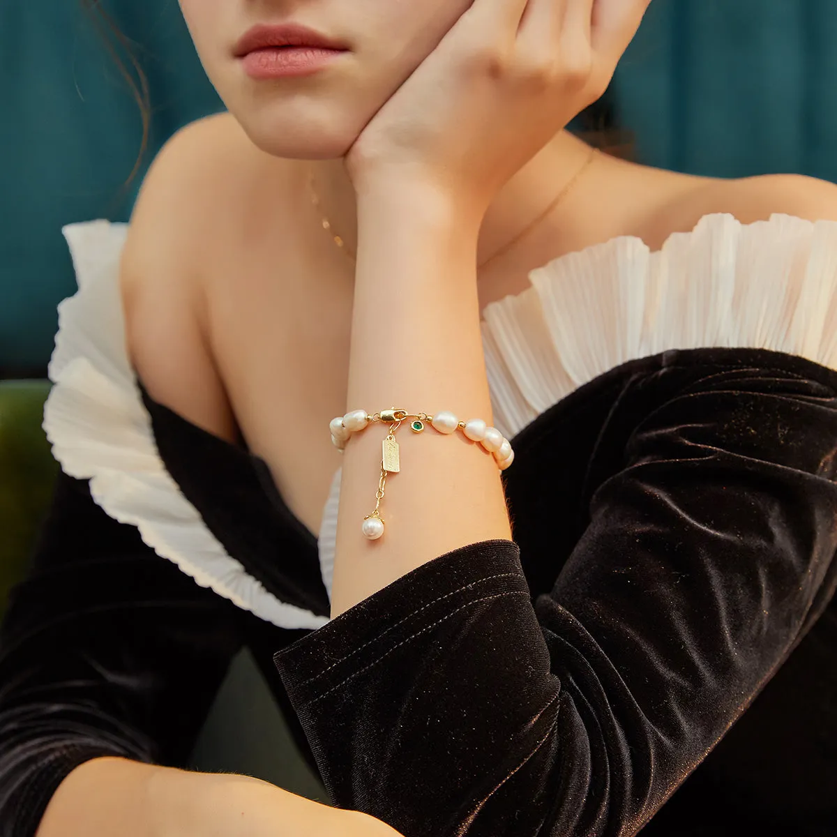 Cultured Pearls and Cross Charm Natural pearl bracelet with elegant charms for women