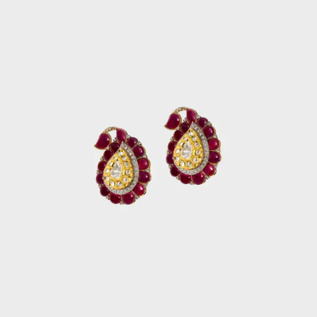 Discover the perfect fusion of elegance and luxury with our exquisite tops, featuring uncut diamonds, brilliant diamond rounds, and vibrant ruby cabs.(KME2238)