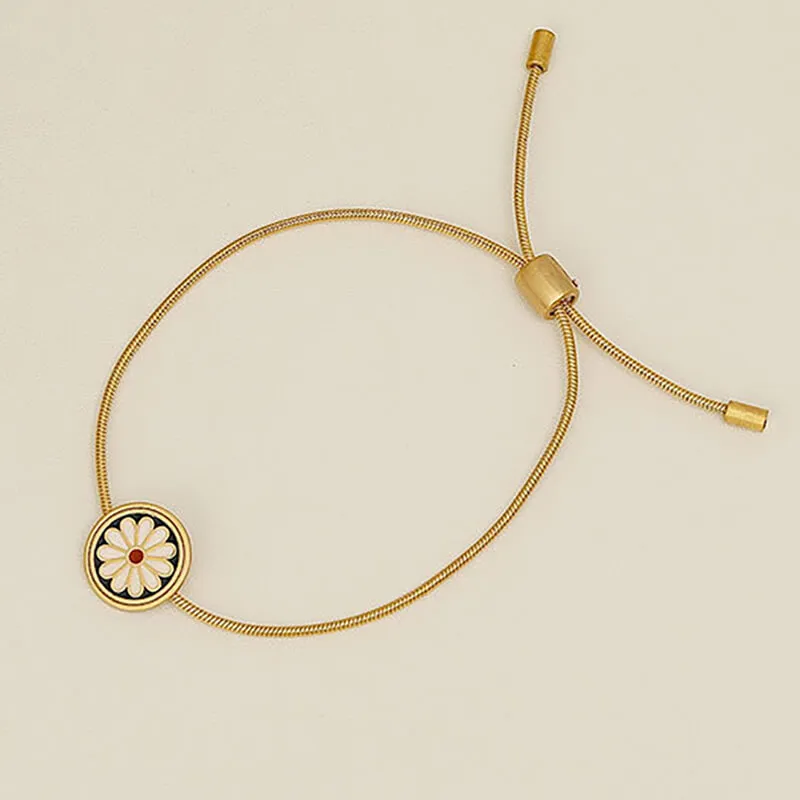 Pulseira Flor Daisy Cordão em Aço Dourada