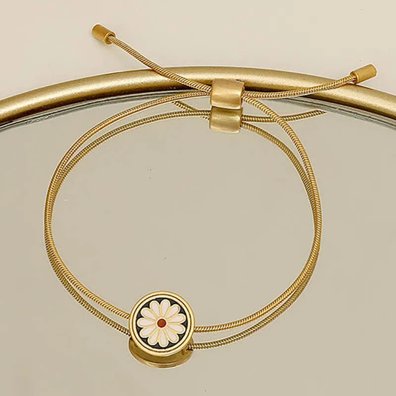 Pulseira Flor Daisy Cordão em Aço Dourada